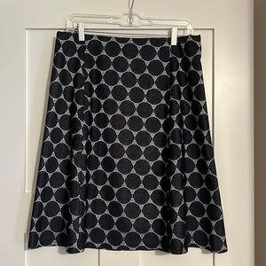 Navy and whit polka dot skirt.